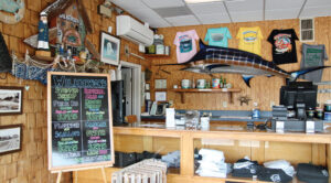 The entrance is filled with memorabilia and merchandise, fitting for the restaurant’s loyal following and long ties to the beach community.